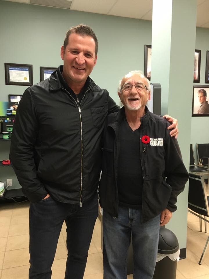 Former Colorado Avalanche defenceman Adam Foote poses for a photo with Oscar Orazietti at Oscar and Dario Unisex Hairstyling and Barbering back in 2016. Orazietti used to serve as Foote's barber when he played for the Soo Greyhounds over 30 years ago.