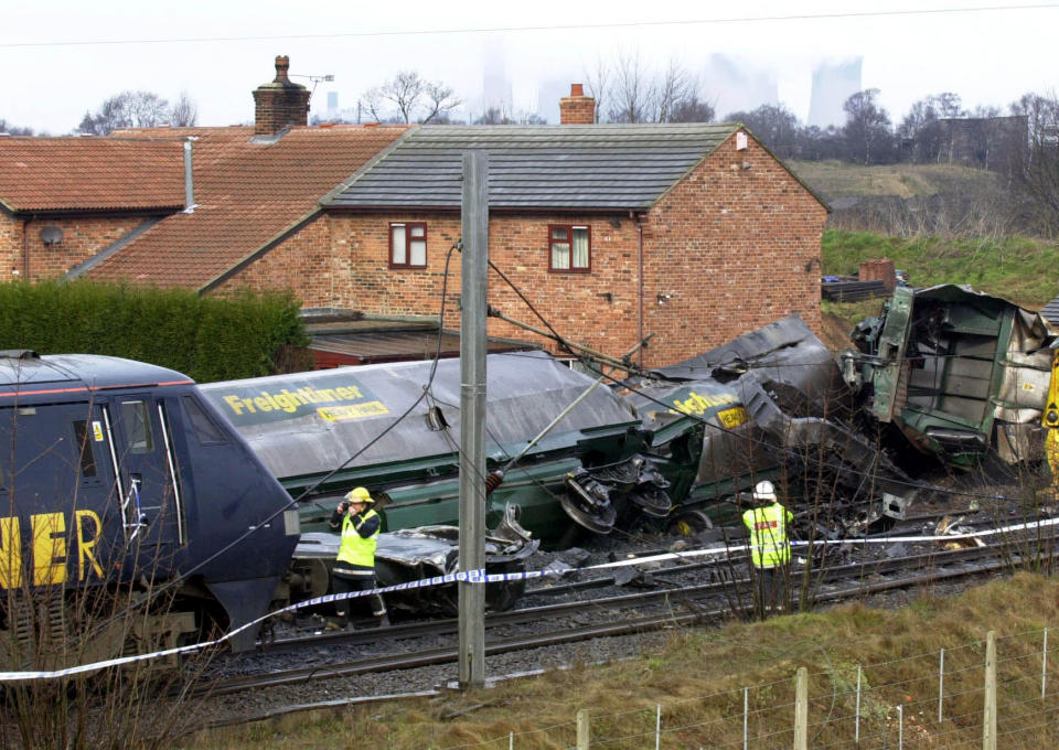 Carriages of a freight train lie derailed at the side of the track after an accident near Selby, North Yorkshire which claimed thirteen lives. A further 70 people were injured when a high-speed GNER passenger train hit a runaway car and then collided with the freight train  * ...  which was carrying more than 1,000 tonnes of coal. The scene of devastation was on the East Coast main line near Selby in North Yorkshire.  28/02/01: The GNER engine 91023, which was involved in the rail crash in Yorkshire, in which 13 people died is the same one which was involved in the crash at Hatfield in October 2000.  The engine was pushing from the back as the express ploughed into a car stuck on the rails. In the Hatfield crash, it was pulling from the front when the rear of the train slipped off the rails causing the accident that killed four people.   (Photo by John Giles - PA Images/PA Images via Getty Images)