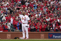 St. Louis Cardinals designated hitter Albert Pujols tips his cap as he steps up to bat during the first inning of a baseball game against the Pittsburgh Pirates Thursday, April 7, 2022, in St. Louis. (AP Photo/Jeff Roberson)