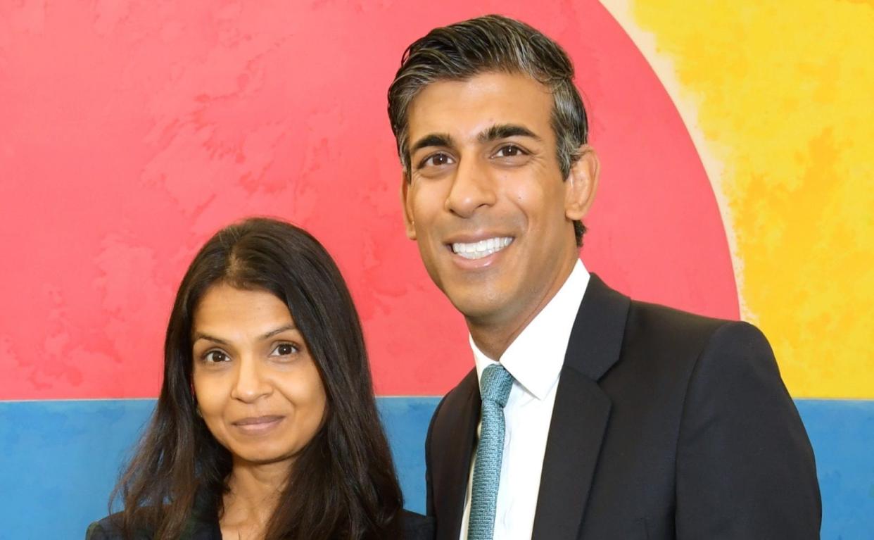Rishi Sunak with his wife Akshata Murty. The PM may have failed to declare Ms Murty's interest in Koru Kids to Parliament - David M Benett/Getty Images