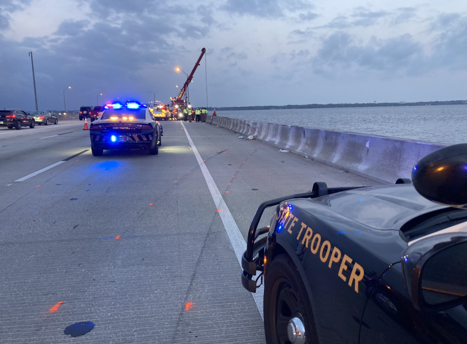 Apparent skid marks are highlighted where a pickup truck crashed over the concrete barrier on the Buckman Bridge when struck by a Road Ranger vehicle on Feb. 28 in Jacksonville.