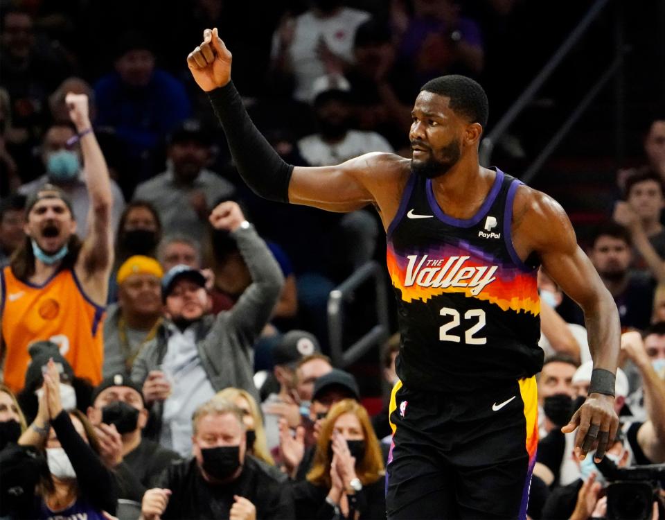 Nov 30, 2021; Phoenix, Arizona, USA; Phoenix Suns center Deandre Ayton (22) reacts after making a basket against the Golden State Warriors at Footprint Center.