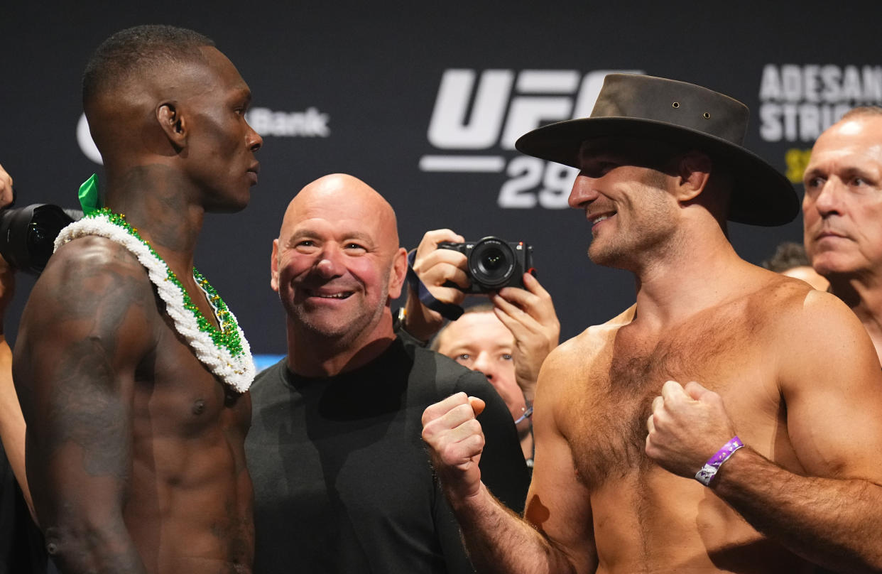 SYDNEY, AUSTRALIA - SEPTEMBER 08: (L-R) Opponents Israel Adesanya of Nigeria and Sean Strickland face off during the UFC 293 ceremonial weigh-in at Qudos Bank Arena on September 08, 2023 in Sydney, Australia. (Photo by Chris Unger/Zuffa LLC via Getty Images)