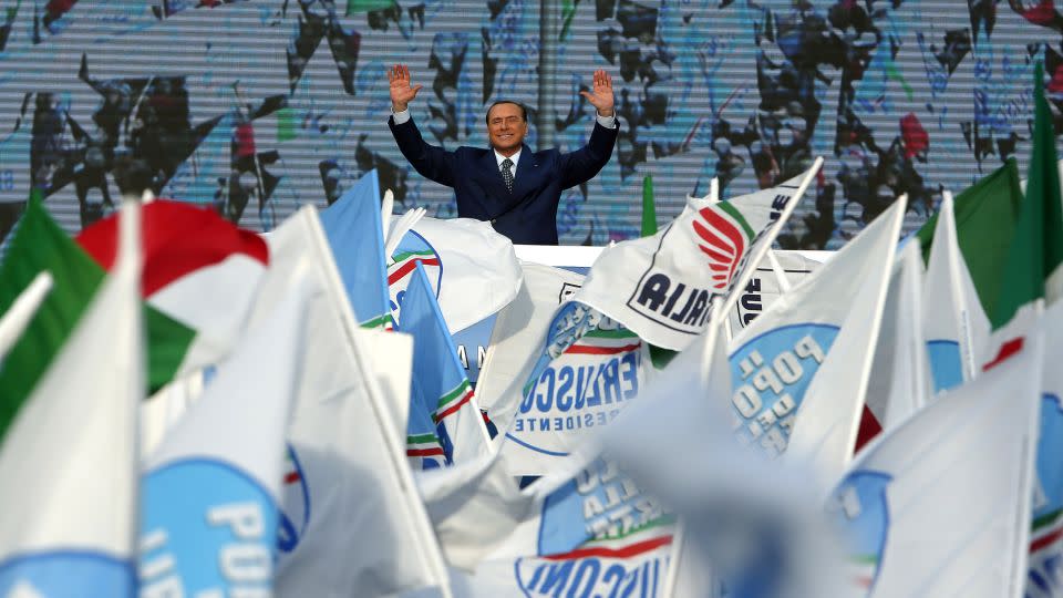 Italy's former Prime Minister Silvio Berlusconi waves in March 2013 during a protest of his People of Freedom (PDL) party against what he called "judicial persecution" by politically motivated magistrates. - Yara Nardi/Reuters