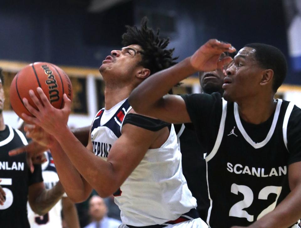 Stepinac's Braylan Ritvo is pressured by Monsignor Scanlan's Dior Anderson during a CHSAA Archdiocesan Tournament semifinal at Mount Saint Michael Academy in the Bronx Feb. 20, 2024. Stepinac won 85-63.