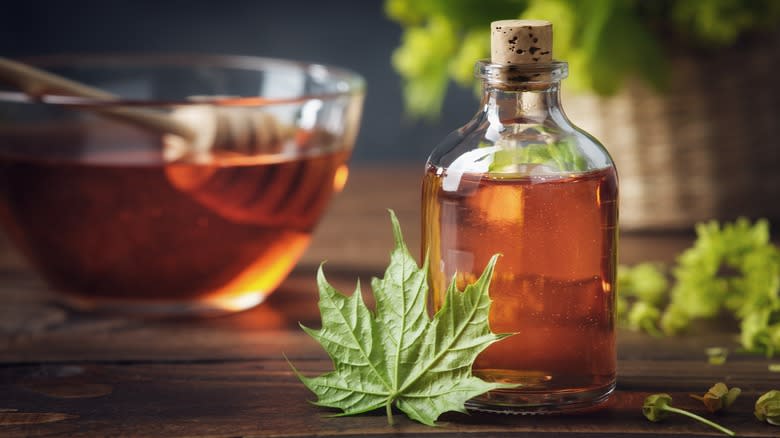 Maple syrup in glass bottle 