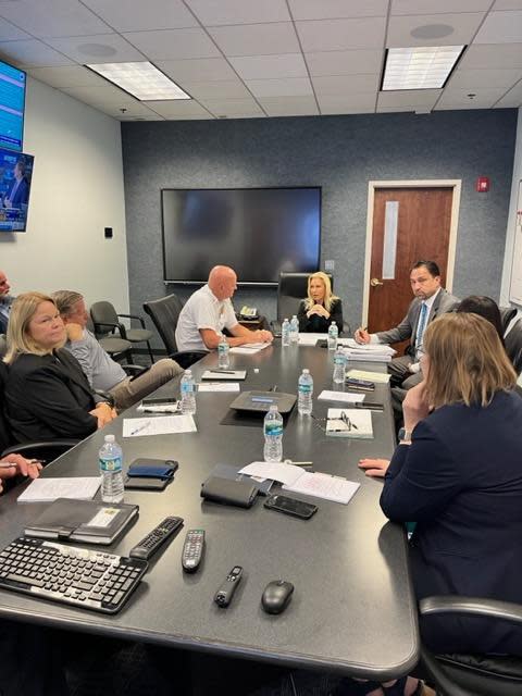 Mayor Donna Deegan, at center, is flanked by Jacksonville Fire and Rescue Department Director Keith Powers and Andre Ayoub, chief of the emergency preparedness division, during a meeting of local leaders about preparing for Hurricane Idalia.