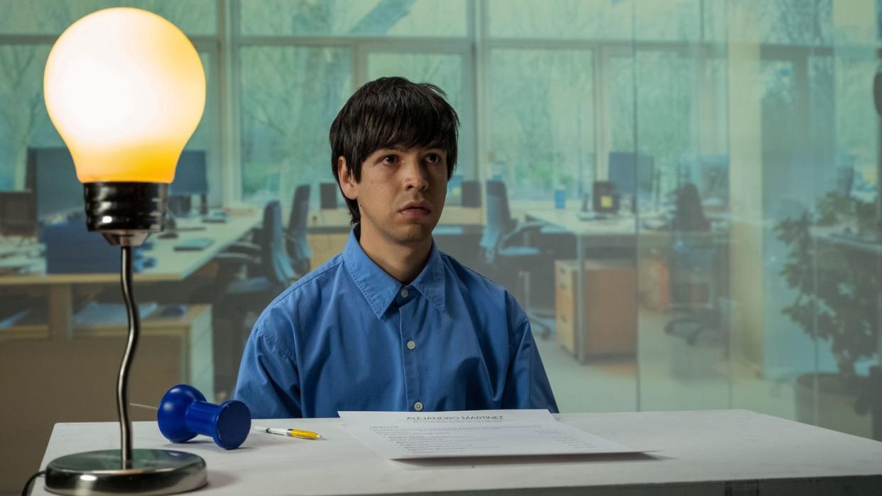 a man sitting at a desk