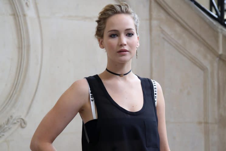 U.S actress Jennifer Lawrence poses for photographers before the presentation of Christian Dior's Spring-Summer 2017 ready-to-wear fashion collection, Friday, Sept. 30, 2016 in Paris. (AP Photo/Thibault Camus)