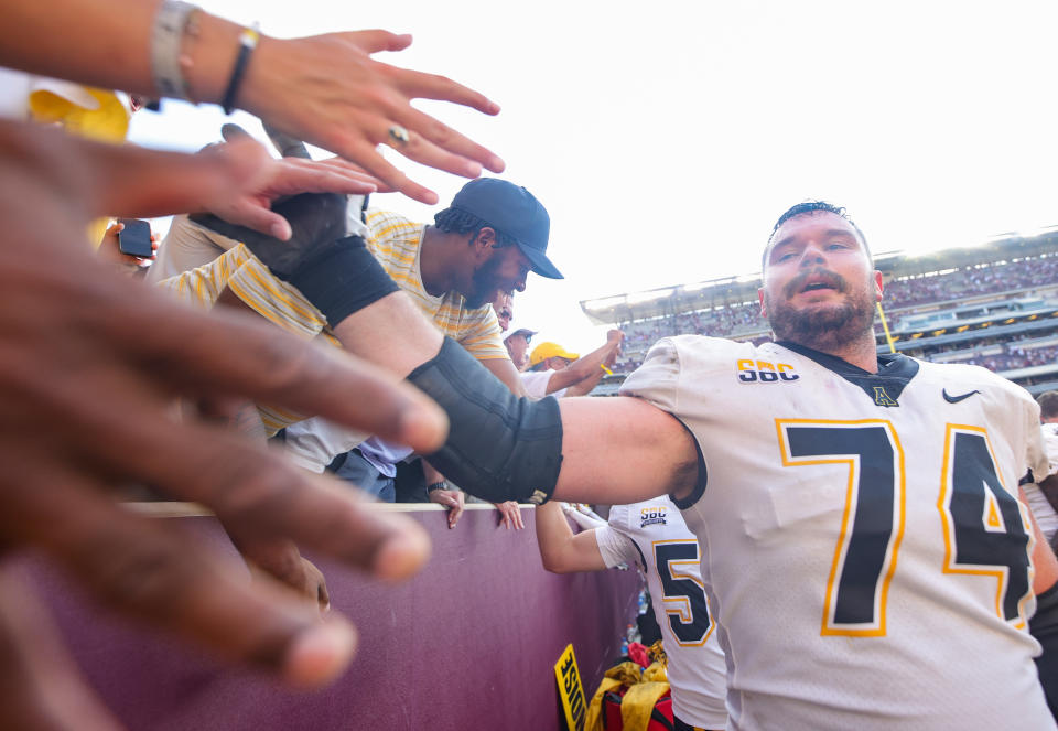 COLLEGE STATION, TEXAS – SEPTEMBER 10: Anderson Hardy #74 of the Appalachian State Mountaineers celebrates defeating the Texas A&M Aggies during the second half at Kyle Field on September 10, 2022 in College Station, Texas. (Photo by Carmen Mandato/Getty Images)