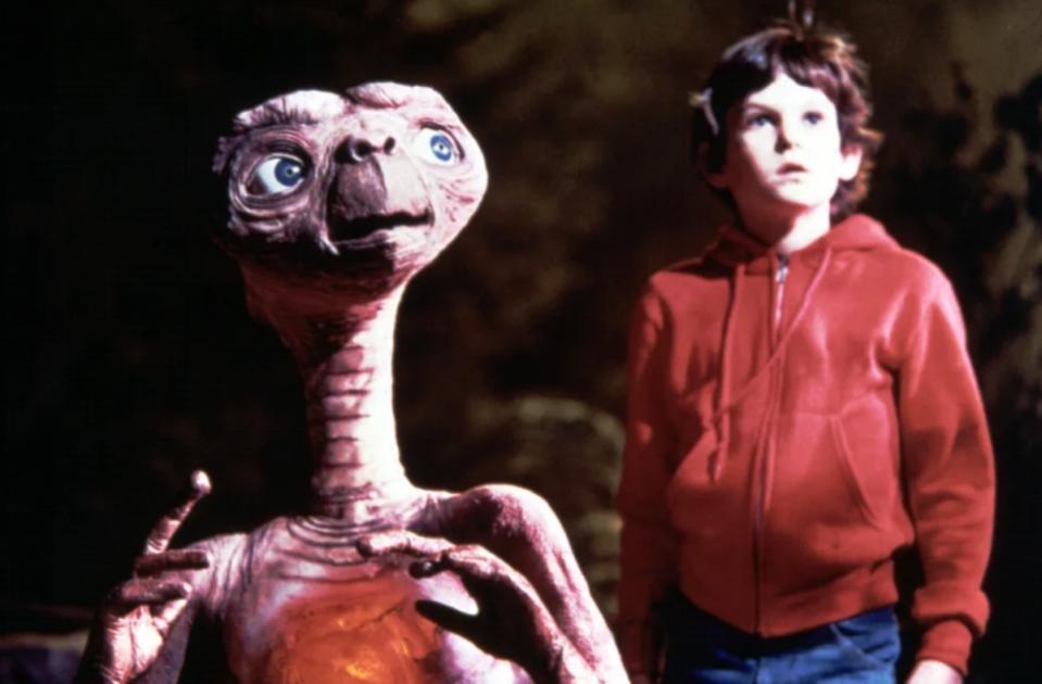 Thomas and his alien co-star in E.T.