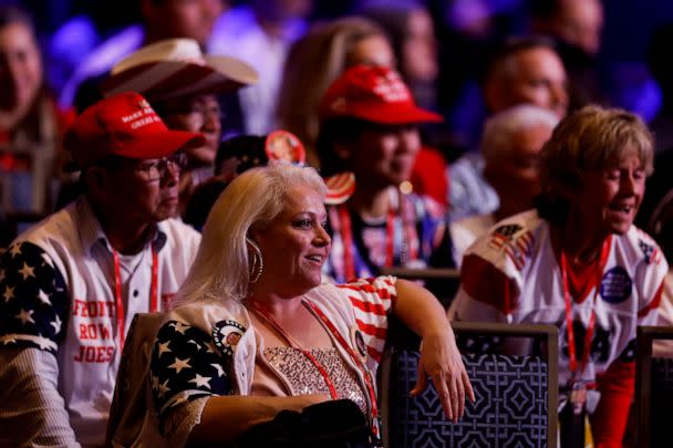 Guests listen as former U.S. President Donald Trump addresses the annual Conservative Political Action Conference (CPAC) at Gaylord National Resort & Convention Center on March 4, 2023 in National Harbor, Maryland. (Anna Moneymaker/Getty Images)