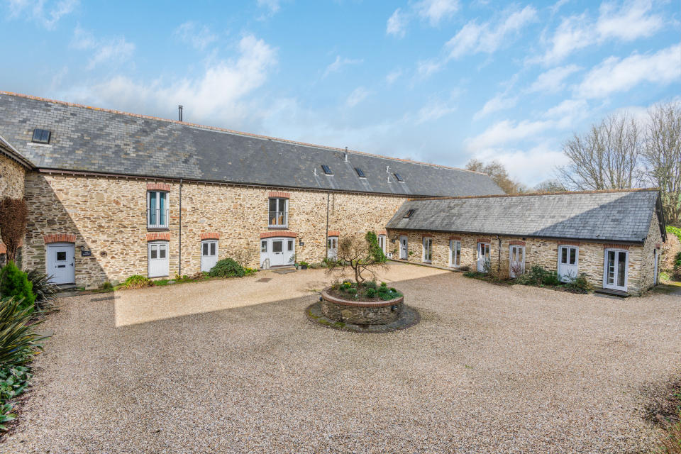 Unusually for a former barn, this property is arranged over three storeys. Photo: Luscombe Maye