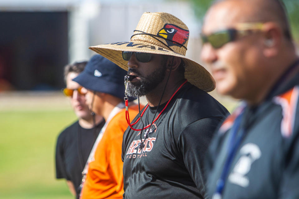 Copper Canyon Football  Head Coach Sean Freeman, center, watches players at practice on Aug. 8, 2019.