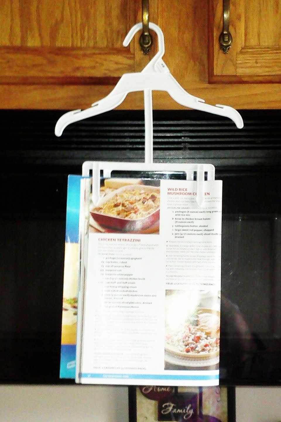 Use a Hanger as a cookbook holder.