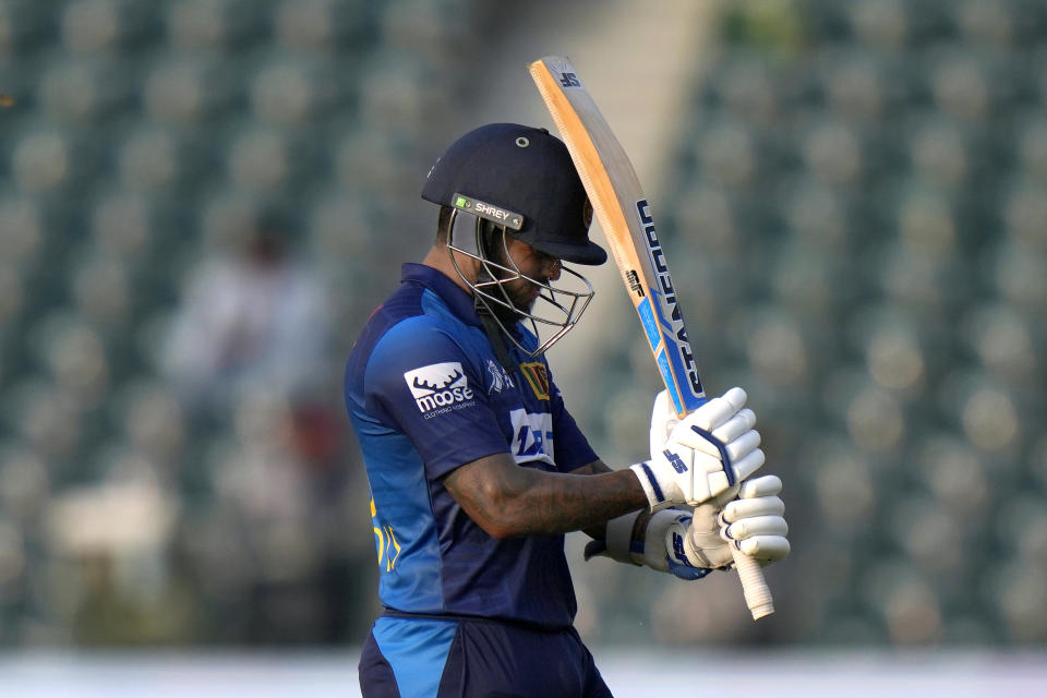 Sri Lanka's Kusal Mendis reacts as he walks off the field after his dismissal during the Asia Cup cricket match between Afghanistan and Sri Lanka in Lahore, Pakistan, Tuesday, Sept. 5, 2023. (AP Photo/K.M. Chaudary)