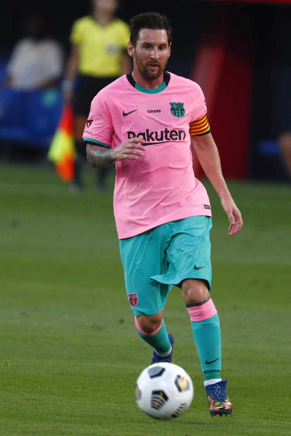 Barcelona's Lionel Messi controls the ball during the pre-season friendly soccer match between Barcelona and Girona at the Johan Cruyff Stadium in Barcelona, Spain, Wednesday, Sept. 16, 2020. (AP Photo/Joan Monfort)