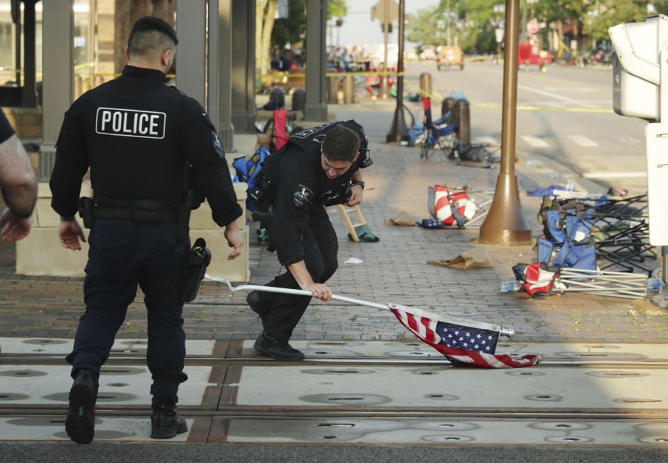 Police on the scene after Monday's mass shooting in Highland Park