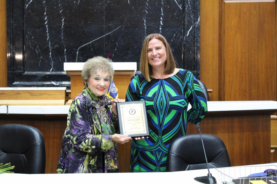 Rep. Sheila Klinker accepting the Legislator of the Year by the Indiana School Social Work Association from Julie Shannon, the Legislative Chair for Indiana School Social Work Association on Oct. 12, 2023.