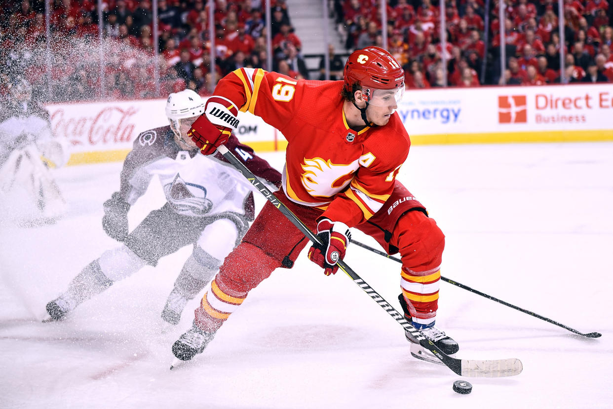 CALGARY, AB - APRIL 11: Calgary Flames Left Wing Matthew Tkachuk (19) skates with the puck in the Colorado Avalanche zone during the second period of Game One of the Western Conference First Round during the 2019 Stanley Cup Playoffs where the Calgary Flames hosted the Colorado Avalanche on April 11, 2019, at the Scotiabank Saddledome in Calgary, AB. (Photo by Brett Holmes/Icon Sportswire via Getty Images)