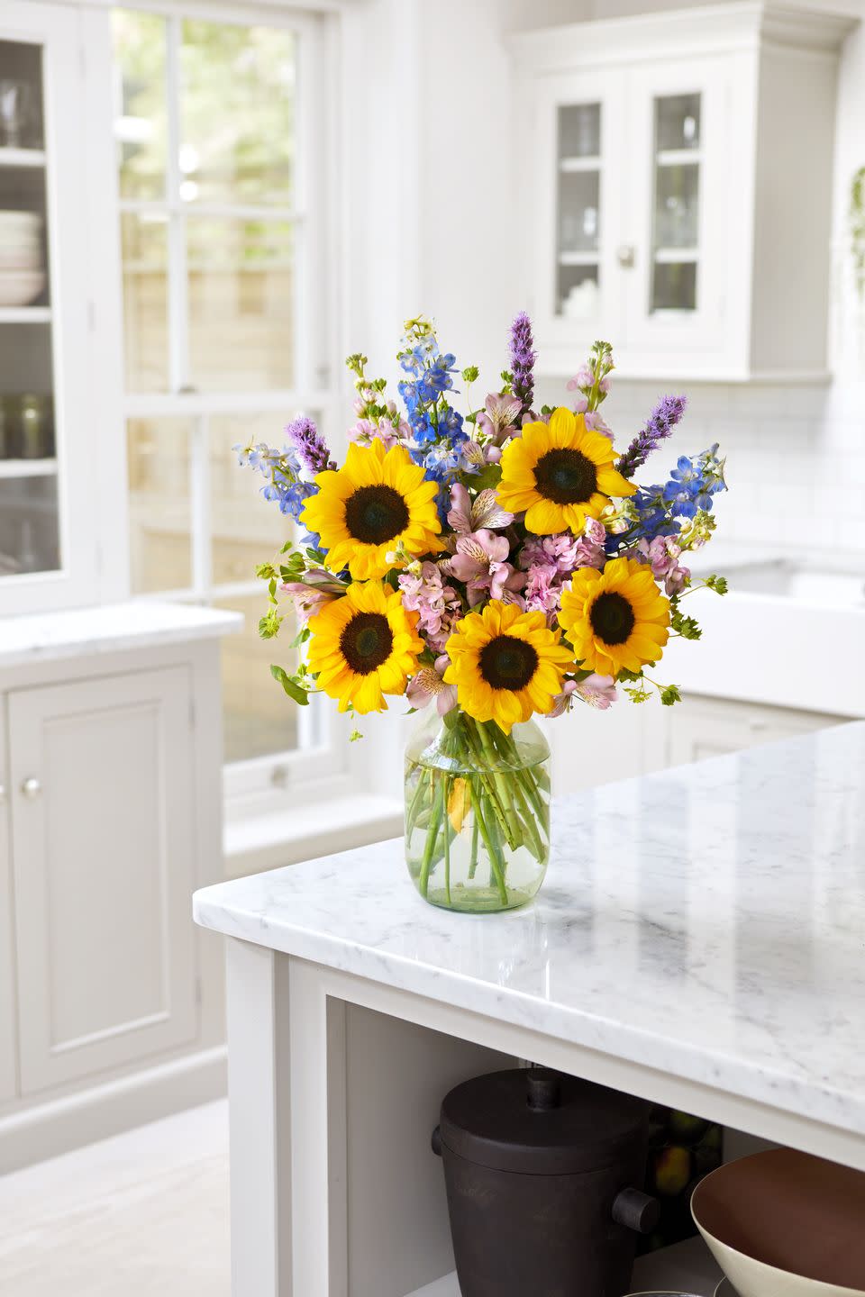 <p>Sunflowers are an absolute must! Complete with sweet stocks and bold delphinium, we'd love this in the kitchen or bedroom.</p><p>Bloom & Wild says: 'Sweet-smelling stocks meet blooming sunflowers. We think Nyah makes the perfect bedside bouquet to wake up to each morning. Treat yourself, or one of your favourite people.'</p><p><a class="link " href="https://go.redirectingat.com?id=127X1599956&url=https%3A%2F%2Fwww.bloomandwild.com%2Fsend-flowers%2Fbouquet%2Fthe-nyah-ht&sref=https%3A%2F%2Fwww.housebeautiful.com%2Fuk%2Fgarden%2Fplants%2Fg33409082%2Fbloom-wild-flowers%2F" rel="nofollow noopener" target="_blank" data-ylk="slk:SHOP NOW;elm:context_link;itc:0;sec:content-canvas">SHOP NOW</a></p>
