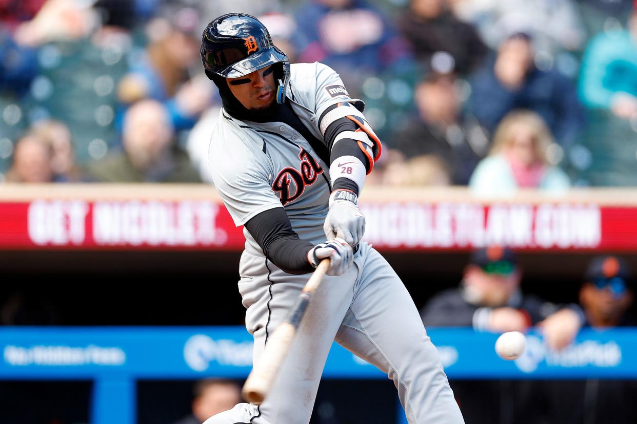 Javier Baez of the Detroit Tigers hits an RBI double against the Minnesota Twins in the seventh inning at Target Field on Saturday, April 20, 2024, in Minneapolis, Minnesota.