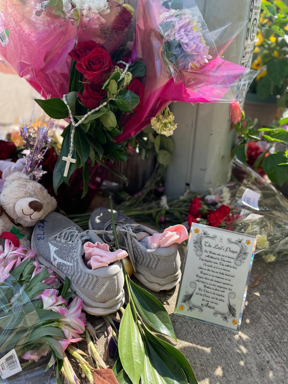 A memorial to 34-year-old Eliza "Liza" Fletcher took shape on the University of Memphis campus near where police say Fletcher was abducted while running on Sept. 2, 2022.