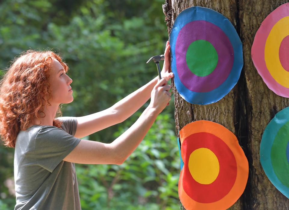 PAL (Play. Advocate. Live Well.) invited the public to come see the River Birch Trail segment of the Daniel Morgan Trail System on Thursday, June 29, 2023. The event featured a ribbon cutting service and gave the public a chance to see art on the River Birch Trail. Artist Lottie Hutson, 22, of Spartanburg puts her art on a tree on the trail.