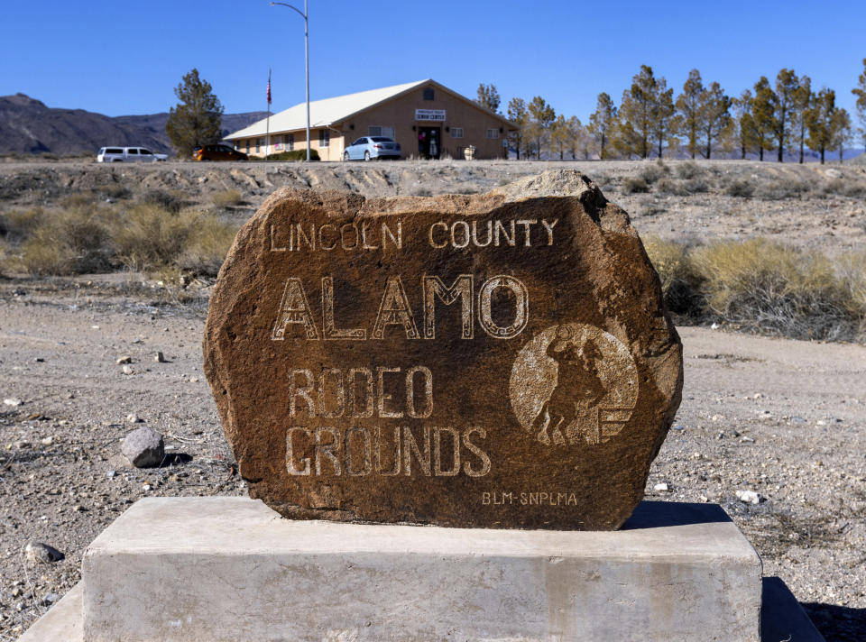 The Alamo Rodeo grounds sign is displayed in front of Alamo Senior Center, in Alamo, Nevada on Friday, Feb. 10, 2023. The town of Alamo board has requested the Lincoln County Commission to change its ordinance to permit the sale of alcoholic beverages in the town's limits. (Bizuayehu Tesfaye/Las Vegas Review-Journal via AP)