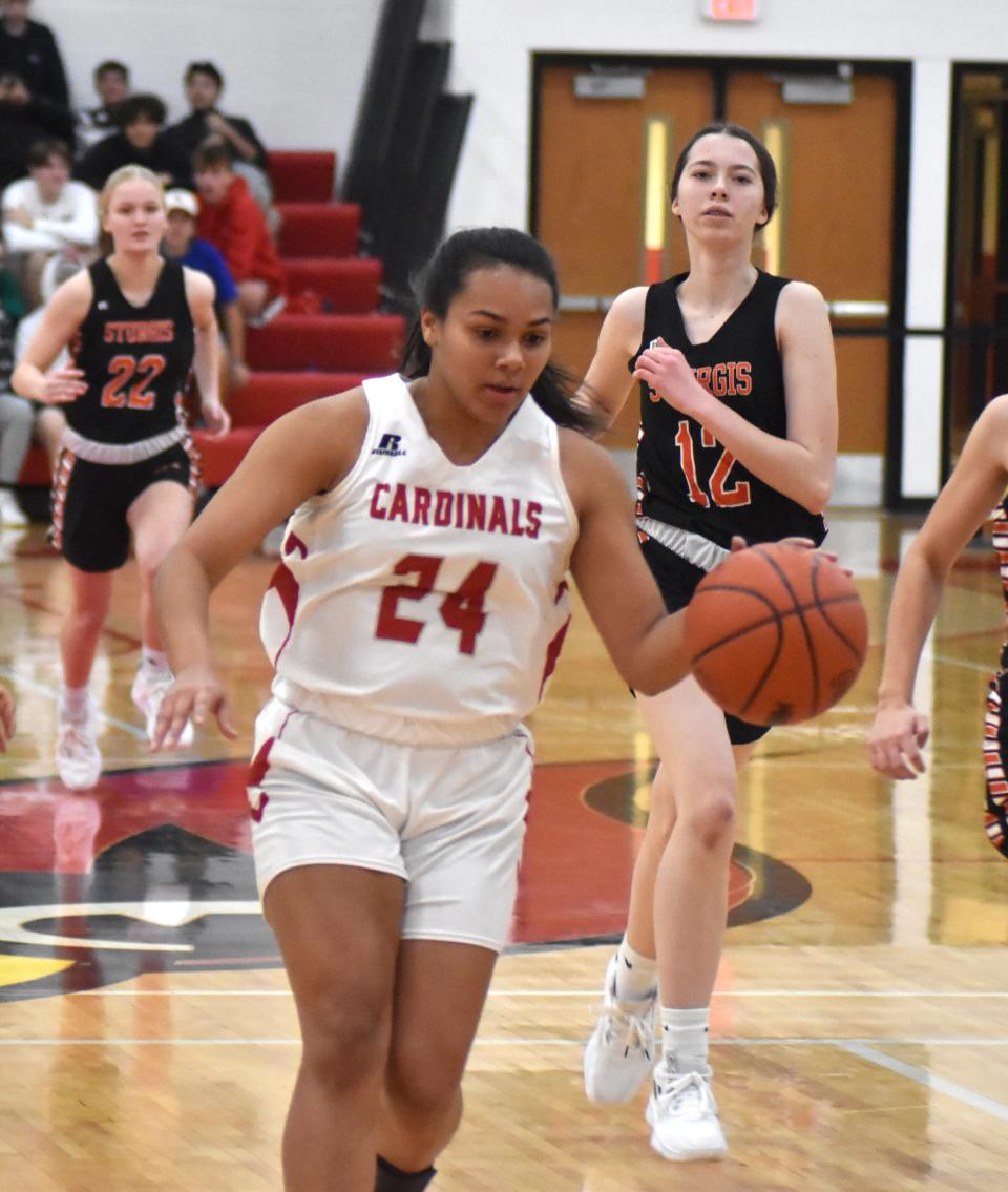 Coldwater's Jaelah Sloan looks to break through the Sturgis defense on the fast break Tuesday night