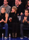 <p>In 2014, <a href="https://people.com/style/taylor-swift-and-karlie-kloss-wear-matching-turtlenecks-while-drinking-matching-beers-plus-more-style-twins-youll-love/" rel="nofollow noopener" target="_blank" data-ylk="slk:Swift attended a New York Knicks game;elm:context_link;itc:0;sec:content-canvas" class="link ">Swift attended a New York Knicks game</a> at Madison Square Garden alongside Karlie Kloss, where she was seen excitedly cheering on the home team with a cold beverage in hand. </p>