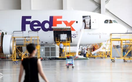 FILE PHOTO: FedEx Express plane is seen at a maintenance base at the airport in Guangzhou