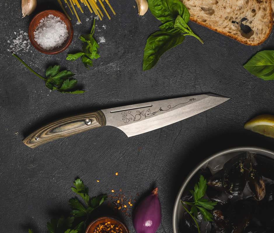 <p>Courtesy Image</p><p>Messermeister has a new initiative called "Forge" in which it's collaborating with chefs on new knives, then donating up to 20 percent of the profits to each chef’s non-profit of choice. First up is April Bloomfield, who selected GreenWave—a company that trains and supports regenerative ocean farmers—as her non-profit. The Messermeister <a href="https://www.messermeister.com/products/chef-april-bloomfield-carbon-6-5-inch-chefs-knife" rel="nofollow noopener" target="_blank" data-ylk="slk:April Bloomfield Chef’s Knife;elm:context_link;itc:0;sec:content-canvas" class="link ">April Bloomfield Chef’s Knife</a> is a 6.5-inch workhorse with a deep wedge shape for greater hand clearance, a high handle position to keep the weight of the knife before the grip, and a shallow rocker that lends optimal contact with a cutting board. A fuller groove near the spine gives Mom an anchor point if she likes to use a pinch grip. What's really special are the design elements, in my opinion. The carbon-steel blade has original artwork by Bloomfield etched into it and the handle is crafted from resilient Spanish hardwood shavings stabilized with natural resin. The end result is a handle that's far more durable than raw wood but with all the visual interest of grain.</p>