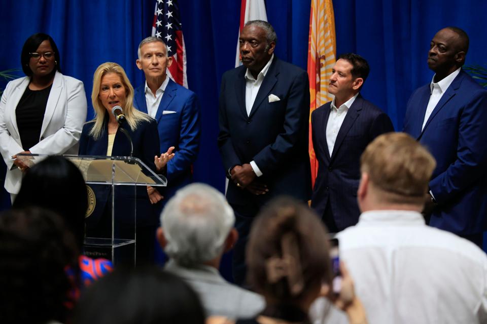 Mayor Donna Deegan speaks at a news conference on May 25 announcing her volunteer transition team: Lakesha Burton (from left), Kevin Gay, Nathaniel “Nat” Glover, David Miller and Darnell Smith. Held at Jacksonville City Hall, this was Deegan’s first media briefing after being elected.