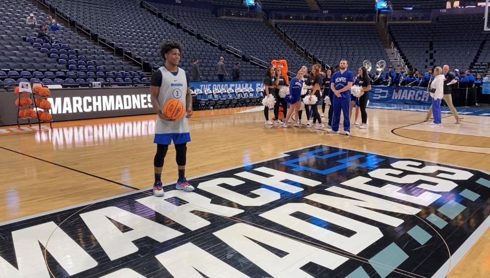 Memphis star Kendric Davis poses for a photo on the court at Nationwide Arena in Columbus, Ohio, Thursday after the team's open practice at the NCAA tournament.
