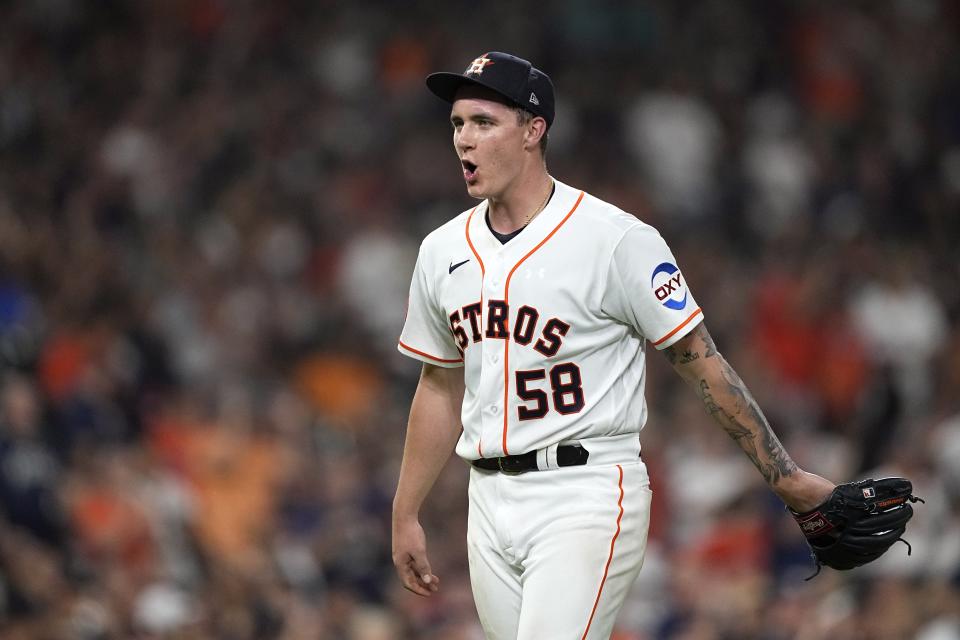 Houston Astros starting pitcher Hunter Brown reacts after center fielder Jake Meyers caught a fly ball by Dominic Smith during the seventh inning of a baseball game Tuesday, June 13, 2023, in Houston. (AP Photo/David J. Phillip)