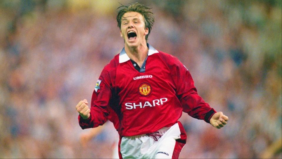 David Beckham celebrates after scoring the third goal in the 1996 FA Charity Shield between Manchester United and Newcastle United at Wembley Stadium in London, England.