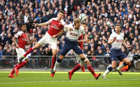 Mustafi's clumsy challenge on Kane allowed Spurs back into the game - Credit: GETTY IMAGES