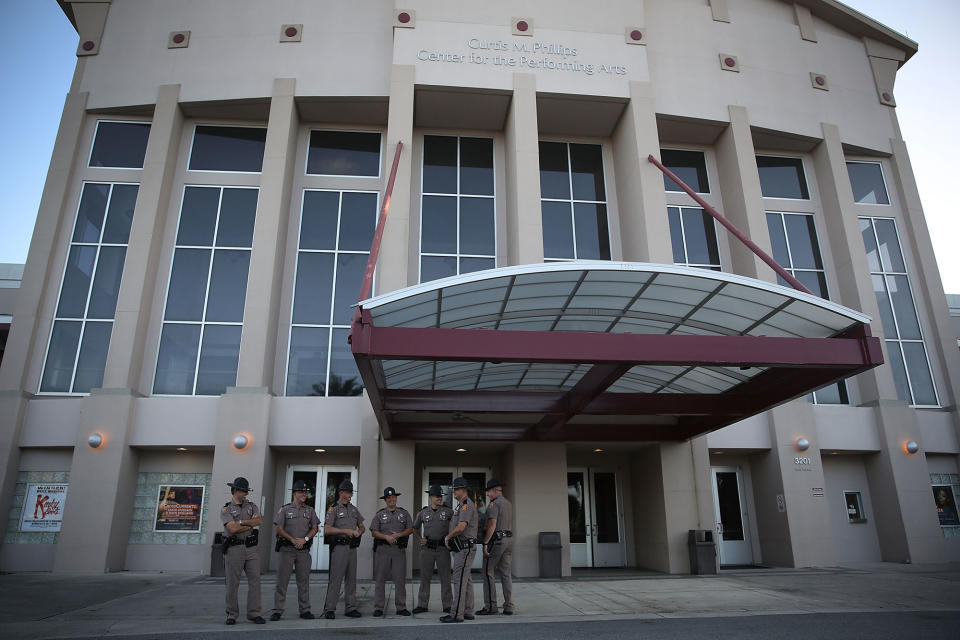 <p>Florida Highway Patrol officers stand outside the Curtis M. Phillips Center for the Performing Arts as they prepare the venue for Thursday’s scheduled speech by white nationalist Richard Spencer on Oct. 18, 2017 in Gainesville, Fla. Reports indicate security for the event will cost about $500,000. (Phot: Joe Raedle/Getty Images) </p>