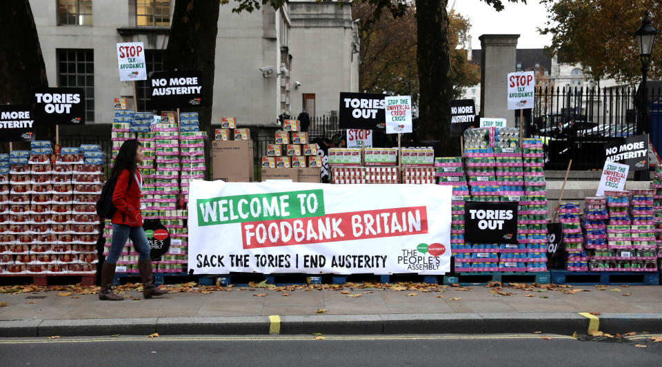 Anti-austerity campaign organisation The People’s Assembly dump stacks of food opposite Downing Street in Westminster, London, Britain, November 21,2017. REUTERS/Simon Dawson     TPX IMAGES OF THE DAY