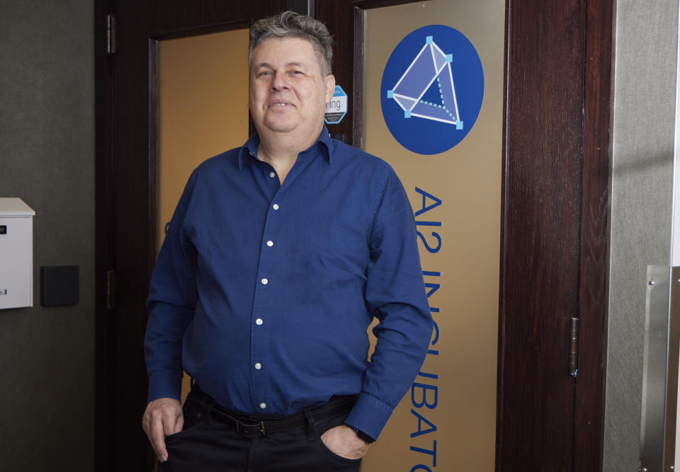 Oren Etzioni poses for photos at the Allen Institute for Artificial Intelligence where he serves as advisor & board member, Friday, Dec. 8, 2023, in Seattle. Experts are warning that the spread of misinformation could get worse in the coming presidential election contest. The safeguards that attempted to counter the bogus claims the last time are eroding, while the tools and systems that create and spread them are only getting stronger. (AP Photo/John Froschauer)