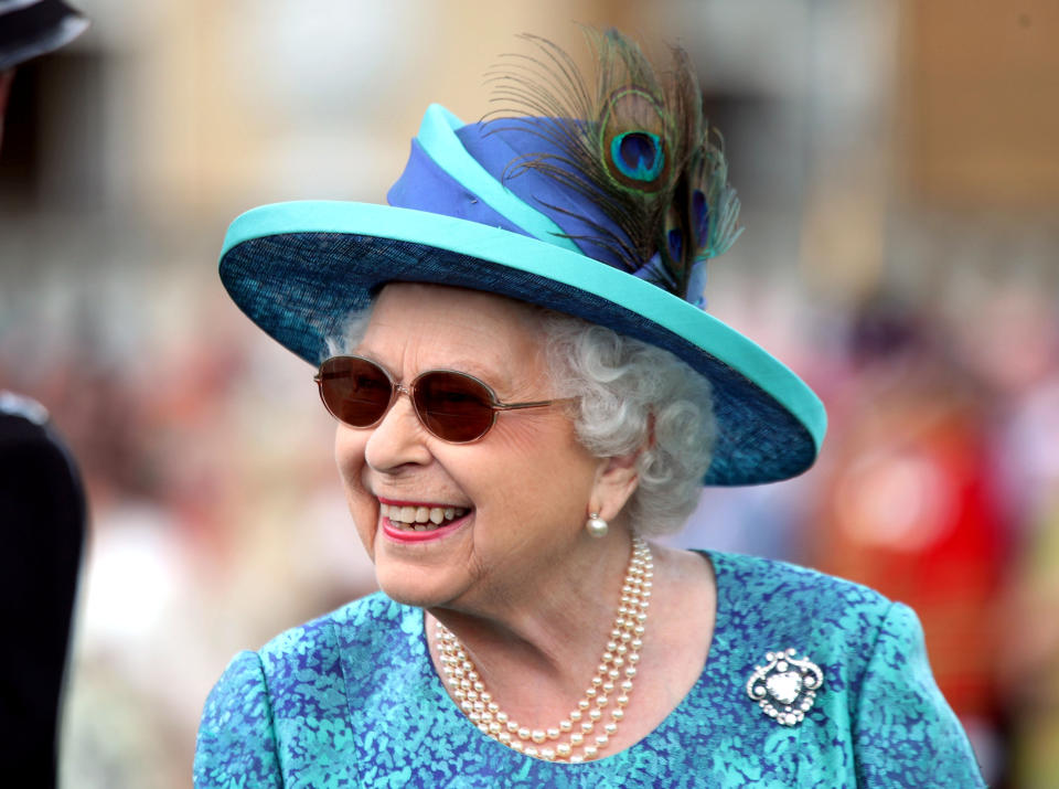 File photo dated 31/5/2018 of Queen Elizabeth II during a garden party at Buckingham Palace in London, and wearing sunglasses after successful surgery to remove a cataract from one of her eyes. The Queen was in robust health for most of her life and seldom took time off during her lengthy reign and illnesses were few and far between over the years. Issue date: Thursday September 8, 2022.