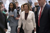 Speaker of the House Nancy Pelosi, D-Calif., walks to the House chamber to address lawmakers in the wake of Democrats narrowly losing control of the House to Republicans, at the Capitol in Washington, Thursday, Nov. 17, 2022. (AP Photo/J. Scott Applewhite)