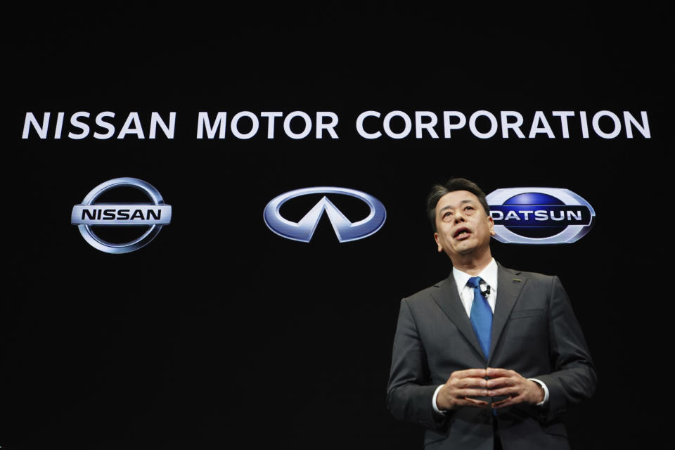 Nissan Chief Executive Makoto Uchida speaks during a press conference in the automaker's headquarters in Yokohama, near Tokyo Monday, Dec. 2, 2019. (AP Photo/Eugene Hoshiko)