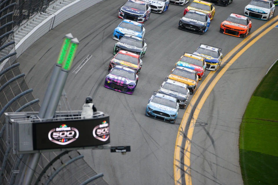 DAYTONA, FL - FEBRUARY 14: Kevin Harvick, driver of the #4 Stewart-Haas Racing Busch Light #TheCrew Ford Mustang, leads the field during the Daytona 500 on February 14, 2021 at Daytona International Speedway in Daytona Beach. Fl. (Photo by David Rosenblum/Icon Sportswire via Getty Images)