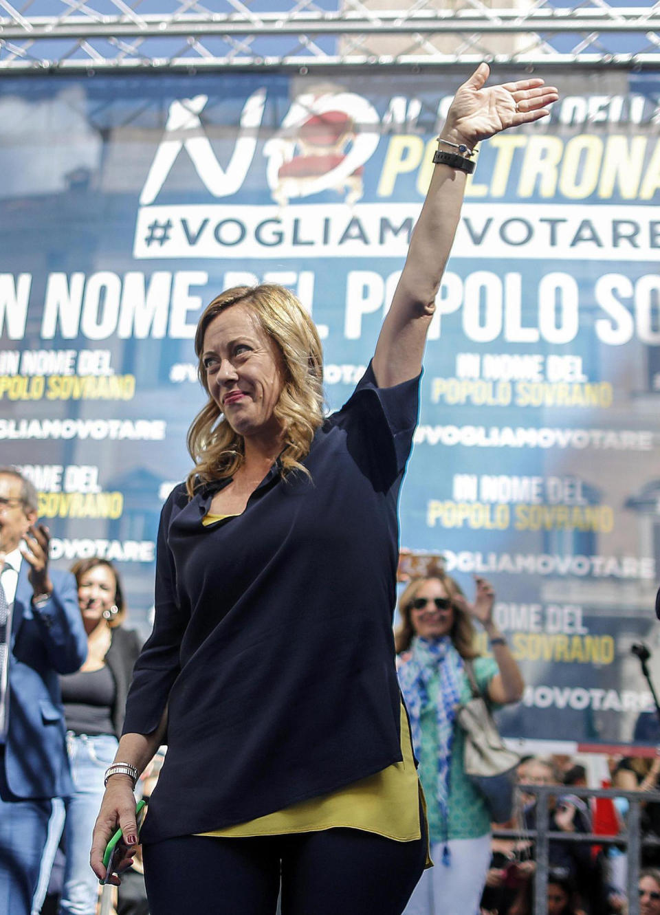 Brothers of Italy right wing party leader Giorgia Meloni waves during a demonstration with the League protesting against the 5-Star and Democratic party coalition government outside the Lower Chamber, in Rome, Monday, Sept. 9, 2019. Conte is pitching for support in Parliament for his new left-leaning coalition ahead of crucial confidence votes and the lower Chamber of Deputies, where the government has a comfortable majority, is set to vote Monday evening. (Riccardo Antimiani/ANSA via AP)
