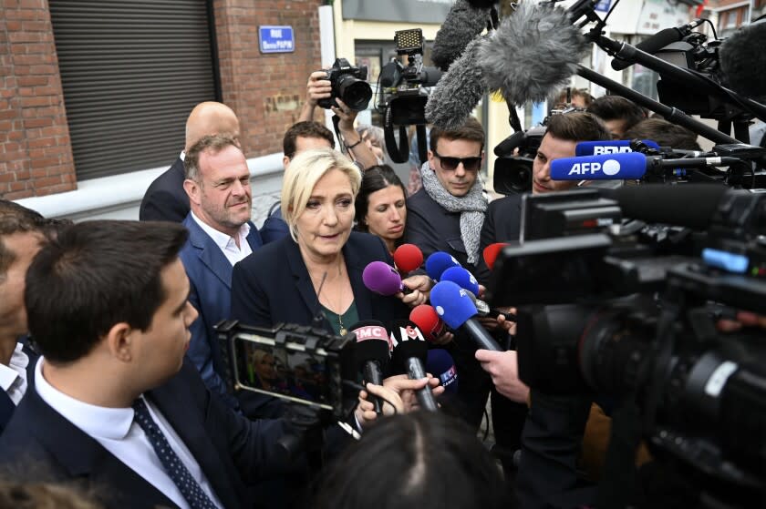 French far-right leader Marine Le Pen adresses reporters Monday, June 20, 2022 in Henin-Beaumont, northern France. French President Emmanuel Macron's centrist alliance was projected to lose its majority despite getting the most seats in the final round of parliamentary elections Sunday, while the far-right National Rally appeared to have made big gains. (AP Photo)