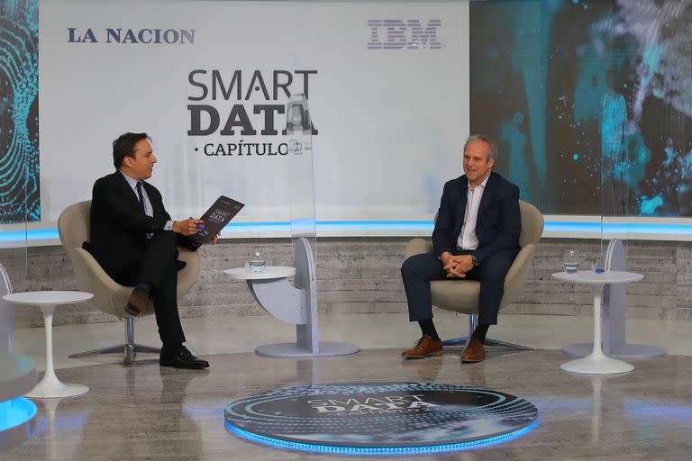 José del Rio, de LA NACION, con Roberto Alexander, de IBM Argentina