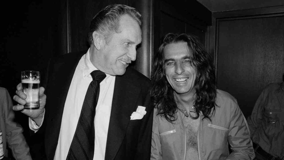 Alice Cooper with Vincent Price at a party in 1975