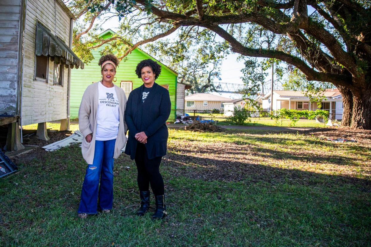 <span>Jo and Joy Banner beside a house that has been in their family for more than 100 years, in Wallace, Louisiana, on 23 November 2021.</span><span>Photograph: Sophia Germer/The Times-Picayune</span>